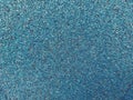 Rough texture of asphalt crumb of blue color. Pink rough wall. Royalty Free Stock Photo
