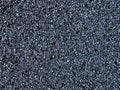 Rough texture of asphalt crumb of blue-gray color. Pink rough wall Royalty Free Stock Photo