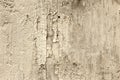 Rough texture of a concrete wall with peeling old paint Royalty Free Stock Photo