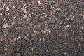 Rough texture of stone, gravel. Road grunge surface. Brown stone background. Small pebbles on the floor, natural rock wall. Royalty Free Stock Photo