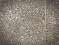 Rough texture surface of exposed aggregate finish, Ground stone washed floor, made of small sand stone in light brown color.