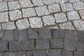 Rough texture of wet block pavement, Saint Malo old side-street. granite Royalty Free Stock Photo