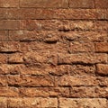 Rough textured clay brick wall
