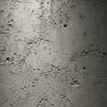 Rough-textured concrete wall featuring various craters and crevices Royalty Free Stock Photo