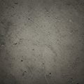Rough-textured gray concrete surface, marked with small pockmarks and subtle Royalty Free Stock Photo