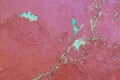 Rough textured surface of a wall made of clay or adobe, background. Cracked old paint. Backdrop Royalty Free Stock Photo