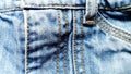 Rough, tough, dense twill weave, from which classic jeans are sewn. Traditionally, denim in indigo dyed only the warp thread. The Royalty Free Stock Photo