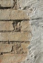 Rough, uneven surface. Cement plaster on a brick wall, texture, background. Old, sloppy, careless brickwork Royalty Free Stock Photo