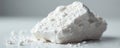 Rough white rock phosphate chunk with phosphorite and white specks. This mineral specimen showcases a textured surface with small Royalty Free Stock Photo