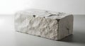 Rough White Stone Block on Gray. Royalty Free Stock Photo