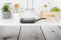 Rough wooden planks in front of defocused kitchen cooking place Royalty Free Stock Photo