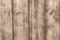 The rough wooden surface of table. Dirty and shabby wooden boards. Old wood plank texture background. Light brown wooden fence, pa Royalty Free Stock Photo
