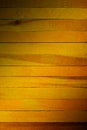 Rough yellow theme wooden partition wall texture background.