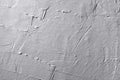 A roughly plastered wall painted with gray paint Royalty Free Stock Photo