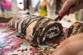 Roulade cake slicing Royalty Free Stock Photo