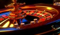 Roulette wheel with few piles of chips on. Casino equipment for gaming and gambling. Close up. Generative AI Royalty Free Stock Photo