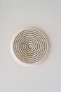 Round air ventilation frame on white ceiling