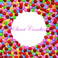 Round background with various sweet candy on frame