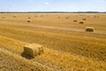 Round bales are bales of hay, straw or forage rolled in the shape of a large cylinder. When the legumes grow to a Royalty Free Stock Photo