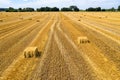 Round bales are bales of hay, straw or forage rolled in the shape of a large cylinder. When the legumes grow to a Royalty Free Stock Photo