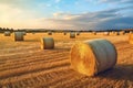 Round bales of straw rolled up on field against blue sky, autumnal harvest scenery. Generative AI