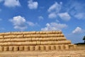 Round bales of straw straightened into a pyramid shape. Royalty Free Stock Photo