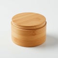 Round bamboo container with matching lid on a white background. The container and Royalty Free Stock Photo