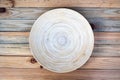 Round bamboo plate on a wooden table
