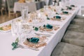 Round Banquet table served. Interior of restaurant for wedding dinner, ready for guests. Decorated with floral arrangement.