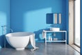 Round bathtub blue bathroom interior Royalty Free Stock Photo