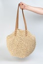 Round beige color straw bag