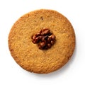 Round biscuit with half walnut isolated on white from above.