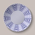 Round blue floral ornament oriental style. Pattern shown on the ceramic platter. Royalty Free Stock Photo