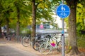 A round blue road sign. The path is permitted for pedestrians and cyclists. Royalty Free Stock Photo