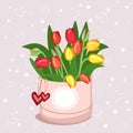 Round box with red, yellow tulips and hearts for Valentine's Day, Women's Day, Mother's Day. A gift for a girl, mom Royalty Free Stock Photo