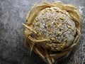 Round bread with seeds. Top View