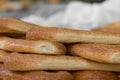 Round bread with Sesame, pretzels. Israeli Arab style. Isolated with blurred background. Royalty Free Stock Photo
