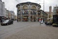 A round building that houses a shopping mall