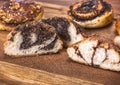 Round buns with poppy seeds and cinnamon Royalty Free Stock Photo