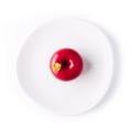 Round cake Raspberry dessert in red glaze