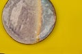 Round ceramic plate on an empty background horizontally