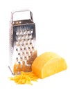 Round of Cheddar Cheese Grated on a White Backgrouned Royalty Free Stock Photo