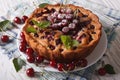 Round cherry pie close up on a plate on the table. horizontal Royalty Free Stock Photo