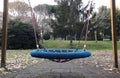 Round children swing in the shape of a UFO Royalty Free Stock Photo