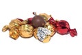 Round chocolate candy with foil packaging isolated on the white background Royalty Free Stock Photo