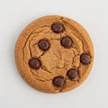 Round chocolate chip cookie with cracks on a light background, isolated on a white background Royalty Free Stock Photo