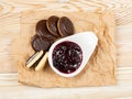 Round chocolate jaffa cake or biscuit cookie filled with natural jam Royalty Free Stock Photo