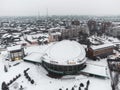 Round circus building dome roof covered in snow