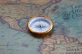 Round classic compass in hand of man as symbol of tourism with compass Royalty Free Stock Photo