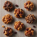 Round clusters of assorted nuts, including walnuts, pecans, almonds, and cashews, are garnished Royalty Free Stock Photo